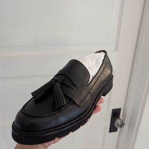 Stuart Weitzman Black Tassel Loafers